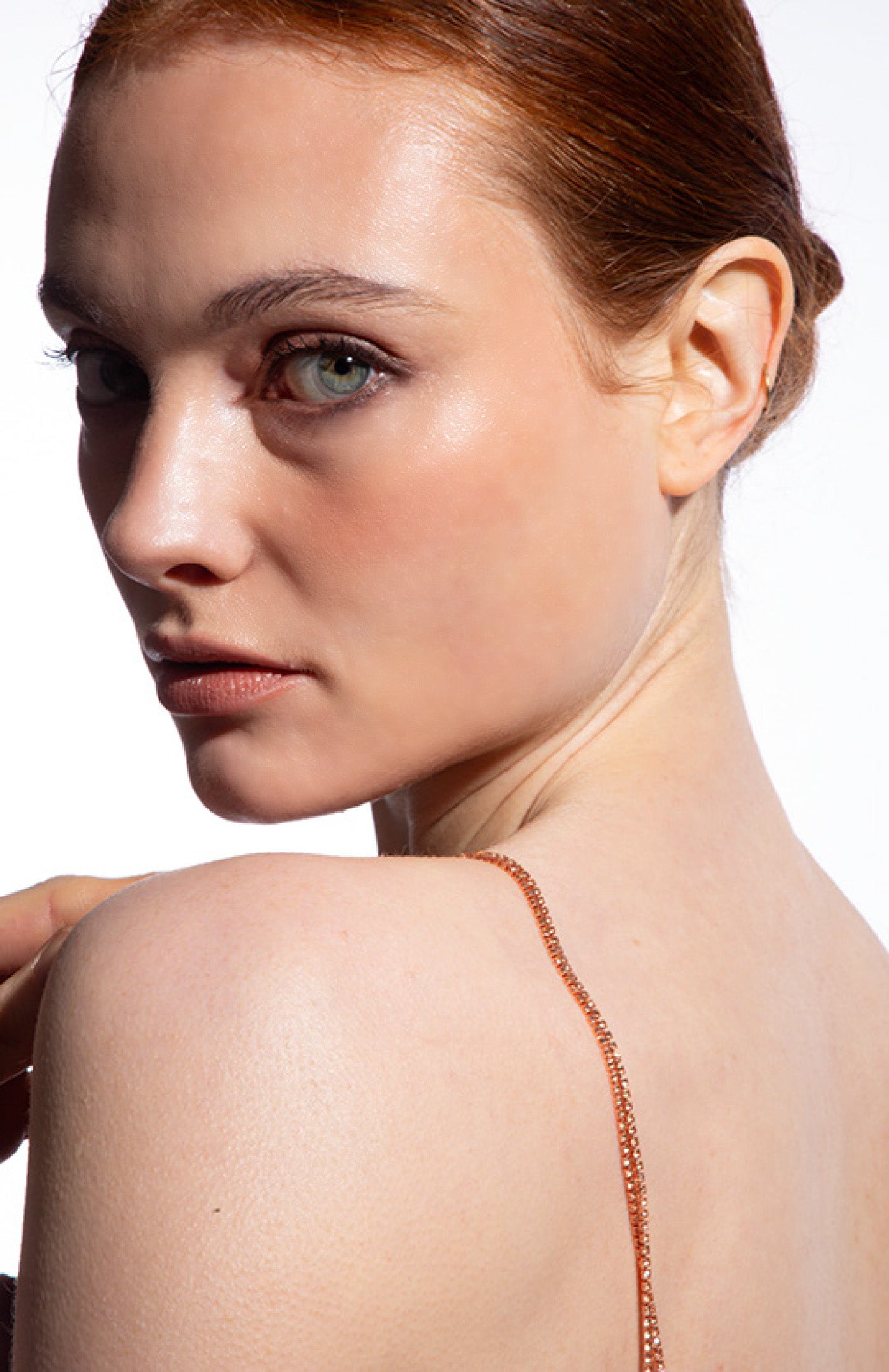 Close-up of Jasmine Satin Dress fabric showing luxurious crystal strap detail by ByVarga