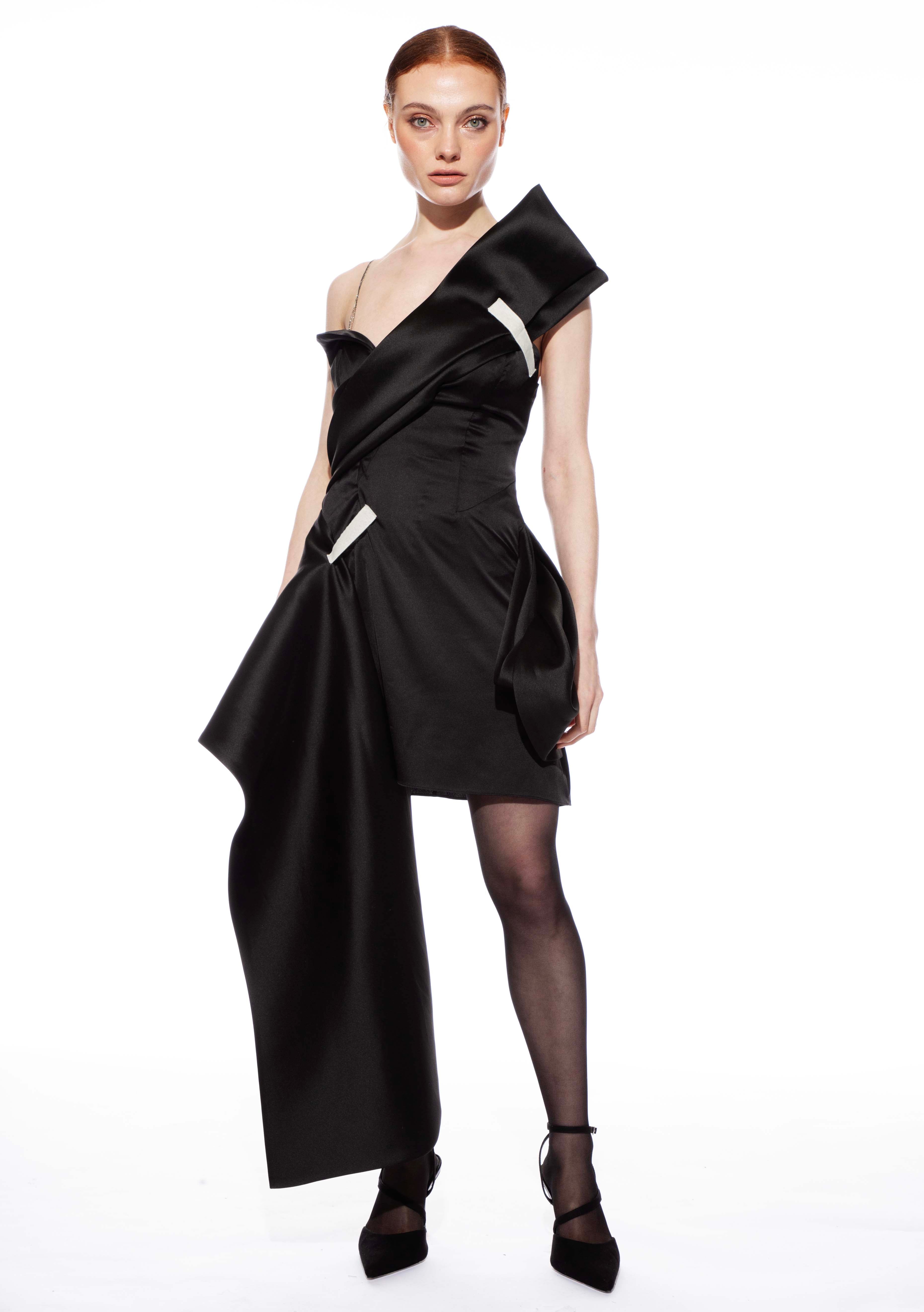 Model wearing Janet black wrap mini dress - elegant styling for autumn winter fashion by ByVarga