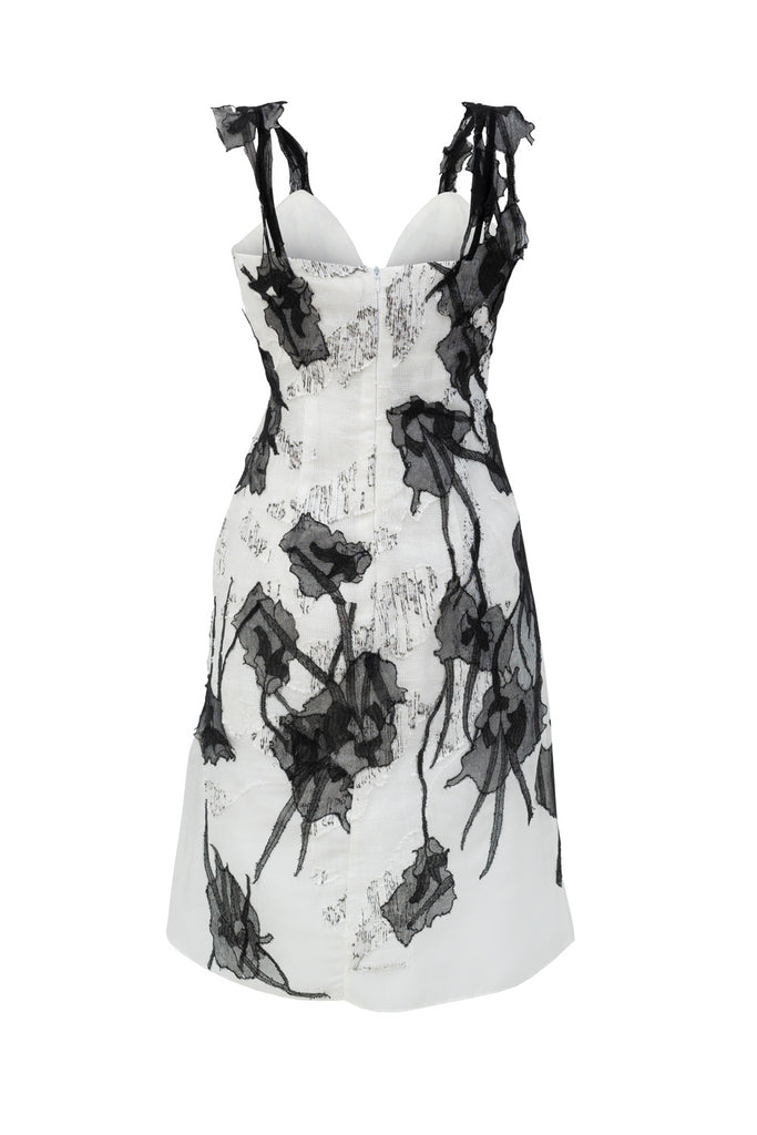 Back view of Jasmine Couture Dress showcasing intricate details and luxurious fabric drape, closure and lace details