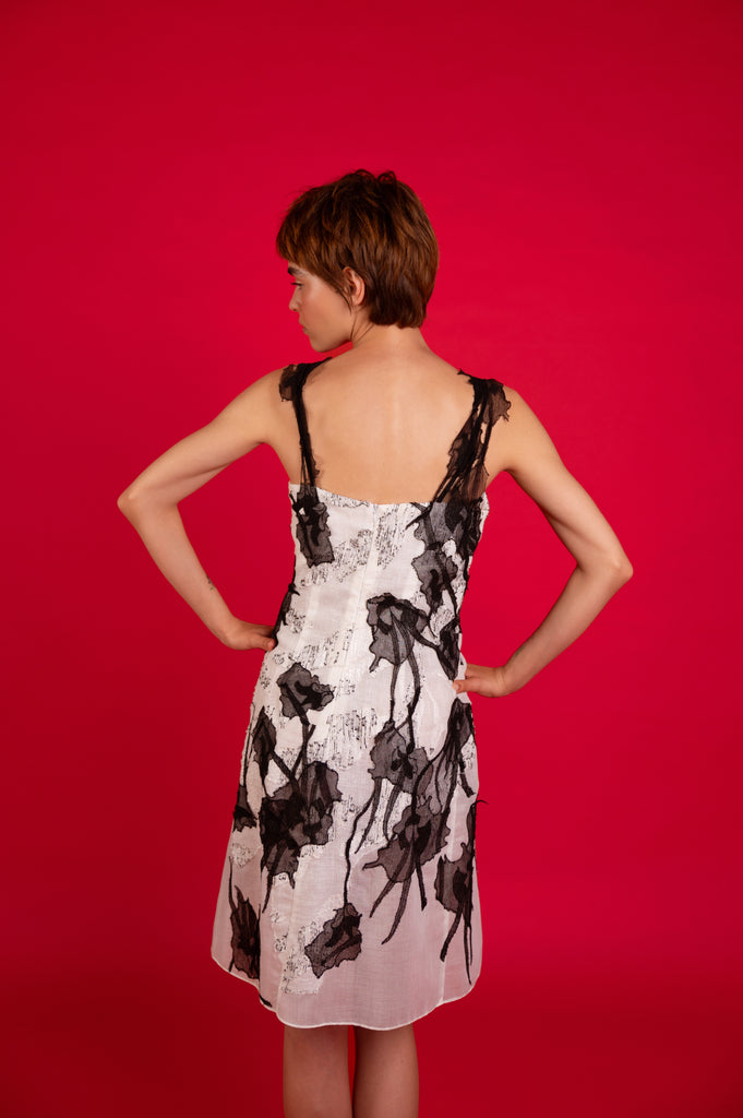 Back view of Jasmine Couture Dress showcasing the dress on a model