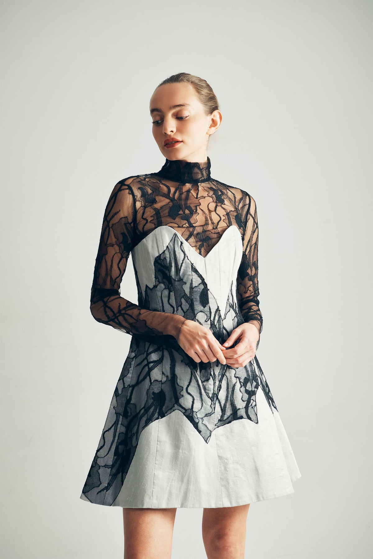 Model Wearing Reanna Corset Dress Styled With Petra Lace Top- ByVarga