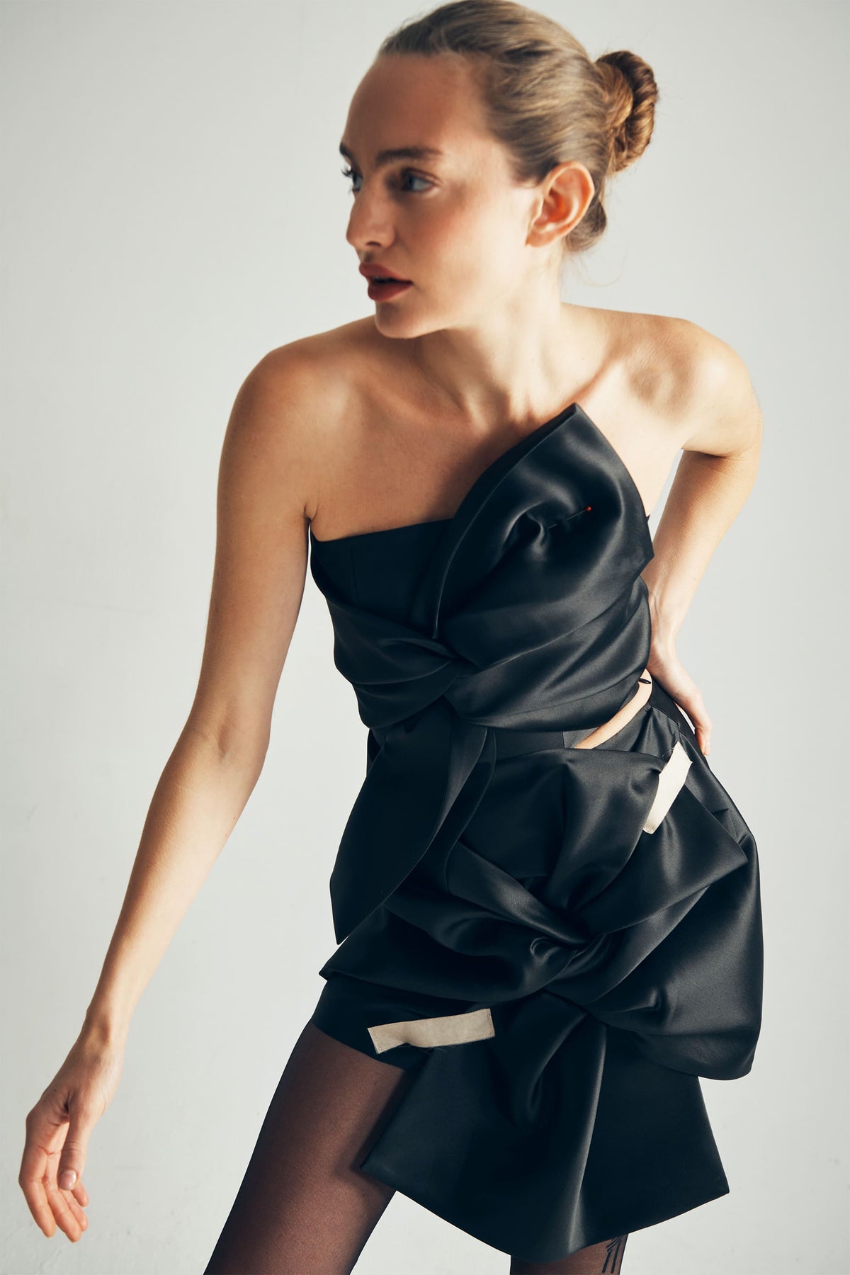 Model wearing Whitney Bow top Styled with Lana Bow Skirt Detail view - byVarga